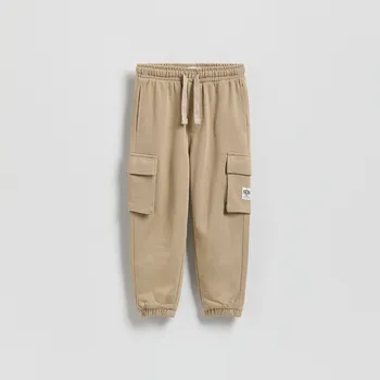 Dětská móda Reserved - Bavlněné kalhoty jogger - béžová - 480HK-08X - 480HK-08X-80