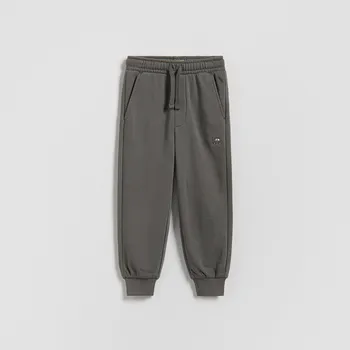 Dětská móda Reserved - Bavlněné jogger kalhoty - tmavě šedá - 474HK-90X - 474HK-90X-80