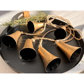 Obraz Zlaté antik zvonky na přírodním laně