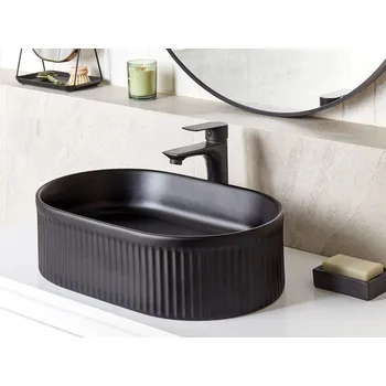 Umyvadlo Koupelnové umyvadlo černá keramika 49x31 cm matný oválný moderní styl Beliani
