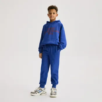 Dětská móda Reserved - Bavlněné jogger kalhoty - modrá - 391HK-55X - 391HK-55X-140