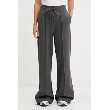 Bavlněné tepláky The North Face NF0A8DZ4RHI1 šedá 90X, vel. L