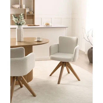 Sada 2 otočných jídelních židlí krémově bílá buklé čalounění dřevěné nohy jídelna Beliani