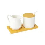 Sada na mléko a cukr s víčkem a lžičkou, bílá keramická konvice na mléko a cukřenka s dřevěným