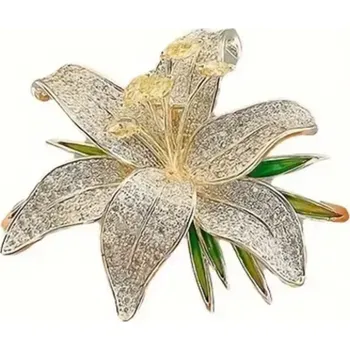 Brož B-TOP Pozlacená brož ve tvaru květu lilie s krystaly