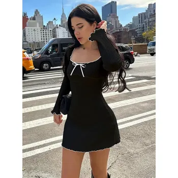 Dámské šaty FIT FASHION Dámské mini šaty s volánky a dlouhým rukávem Velikost: S, Barva (Varianta): Černá