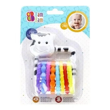 Hračka pro kojence Chrastítko Kravička