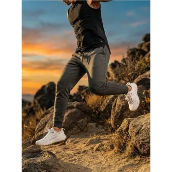 Pánské kalhoty Sinsay - Kalhoty tapered fit - tmavě zelená - 570HL-79X - 570HL-79X-XL