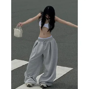 Best Fashion Dámské volné potištěné tepláky ve street stylu Velikost: S, Barva (Varianta): Šedá