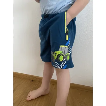 Chlapecké kraťasy KUGO klučičí kraťasy traktor Barva: Modrá, Velikost: 116