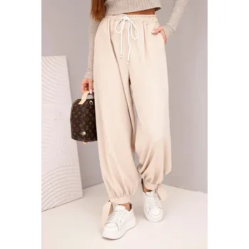 Dámské kalhoty Dámské kalhoty s širokým nohavicí a vázáním dole béžové UNI