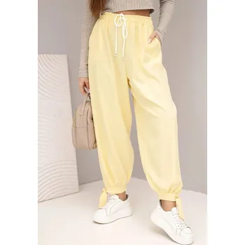 Dámské kalhoty Dámské kalhoty s širokým nohavicím a zavazováním dole žluté UNI
