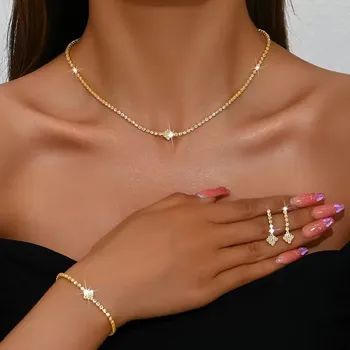 Souprava šperků jednoduchá štrasová souprava Sally - náhrdelník, náramek a náušnice Barva: Zlatá