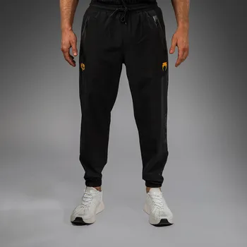 Pánská móda Pánské tepláky Venum x Chimaev Wild Borz - černo/šedé - VENUM-06004-109 Velikosti: S