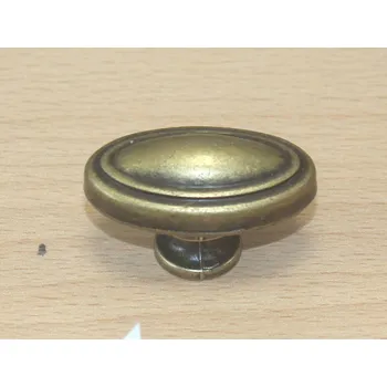 Nábytkové kování 11107-knopka staromosaz 35x19mm (Oválná knopka ze staré mosazi o rozměrech 35x19mm. Protáhlý tvar a autentický antik vzhled s patinou.)
