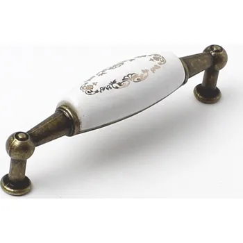 Nábytkové kování 11043 úchytka rozteč 96mm stará mosaz - porcelánový ornament (Úchytka kombinující kov ze staré mosazi a porcelánovou vložku s ornamentálním dekorem. Rozteč 96mm. )