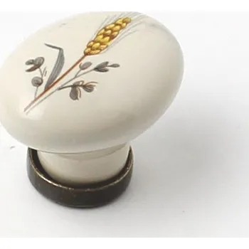 Nábytkové kování 91451 knopka porcelánová 25x34 klásek (Bílá porcelánová knopka s reliéfním motivem klasy. Rozměry 25x34mm, jemný a přírodní design.)
