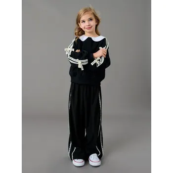 Dívčí kalhoty Sinsay - Tkaninové kalhoty s dekorativní krajkou - černá - 111IL-99X - 111IL-99X-140