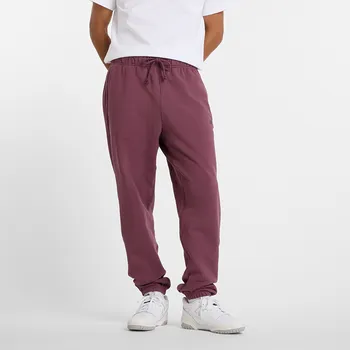 Pánské kalhoty Pánské kalhoty New Balance MP41508FDP – bordó