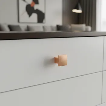 Nábytkové kování Interex design Úchytka knopka AXON / Měď