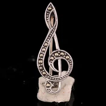 Brož Stříbrná brož houslový klíč osazená markazitem Ag 2,3 g