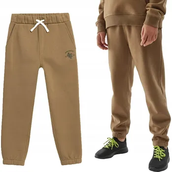 4F tepláky béžové barva velikost 146