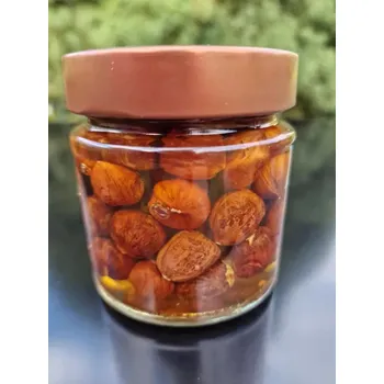 Lískové ořechy v medu 220g