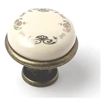 Nábytkové kování 17006 - OLIN 29mm staromosaz porcelán ornament (17006 - OLIN 29mm staromosaz porcelán ornament v povrchu mosaz. Praktický doplněk do interiéru.)