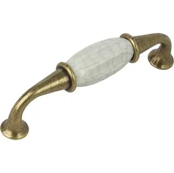 Nábytkové kování 81113 úchytka rozteč 96mm staromosaz porcelán poprask (Nábytková úchytka s roztečí 96 mm v povrchu mosaz. Jednoduchý a funkční doplněk do interiéru.)