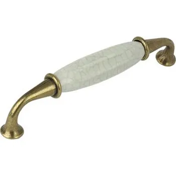 Nábytkové kování 44099 úchytka rozteč 128mm staromosaz porcelán (Nábytková úchytka s roztečí 128 mm v povrchu mosaz. Vhodné řešení pro nábytek v interiéru.)