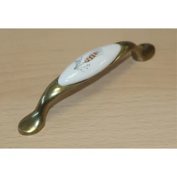 Nábytkové kování 11065 - úchyt 96mm mosaz - porcelánový klásek (11065 - úchyt 96mm mosaz - porcelánový klásek v povrchu mosaz. Jednoduchý a funkční doplněk do interiéru.)