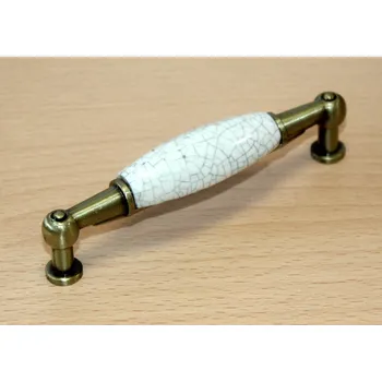 Nábytkové kování 82003 úchytka rozteč 96mm staromosaz-porcelán. mramor poprask (Nábytková úchytka s roztečí 96 mm v povrchu mosaz. Jednoduchý a funkční doplněk do interiéru.)