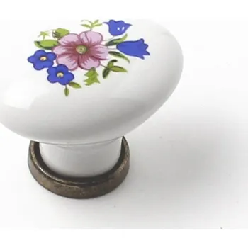 Nábytkové kování 91452 knopka porcelán bílý 25x34 kytka (Bílá porcelánová knopka s jemným květinovým reliéfem. Rozměry 25x34mm, dodává se standardním šroubem. Čistý a nadčasový vzhled.)