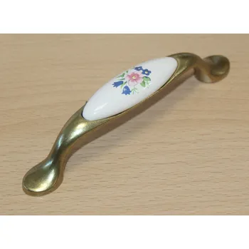 Nábytkové kování 11078 - úchyt 96mm mosaz - porcelánový kytka (11078 - úchyt 96mm mosaz - porcelánový kytka v povrchu mosaz. Vhodné řešení pro nábytek v interiéru.)