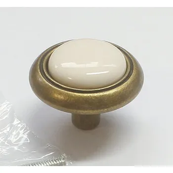 Nábytkové kování 97016 knopka porcelán béžový 31mm (Nábytková knopka o průměru 31 mm. Vhodné řešení pro nábytek v interiéru.)