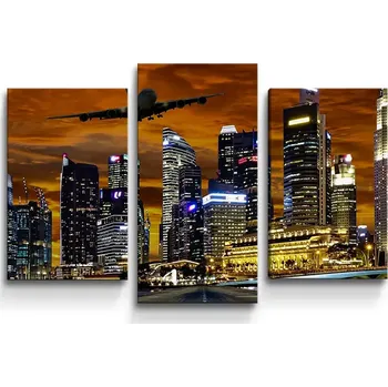 Obraz Sablio Obraz - 3-dílný Letadlo nad mrakodrapy - 75x50 cm
