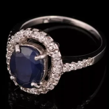 Prsten Stříbrný prsten se safírem a zirkony Ag 4,7 g 53