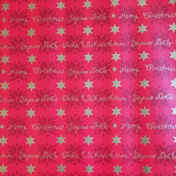 Obraz Červený balicí papír na dárky 70 cm x 2 m 25m70