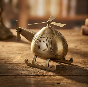 Pokladnička Pokladnička helikoptéra 19 × 7,2 × 11,6 cm mosazná barva