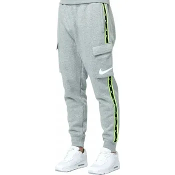 Vel. S NIKE PÁNSKÉ TEPLÁKY BAVLNA KAPSÁČE šedé pohodlné sportovní