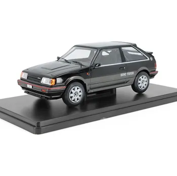 autíčko Mazda 323 4WD Turbo 1:24 - WhiteBox Mazda 323 4 WD Turbo - kovový model auta
