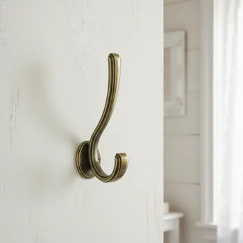 Věšák Interex design Nábytkový věšák ARLES / Mosaz patina lesklá