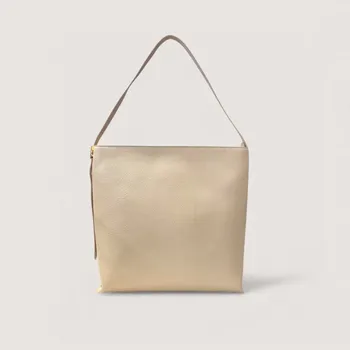 Kabelka COCCINELLE C-ME LOCK SHOPPER KOŽENÁ KABELKA SANDSHELL SS26