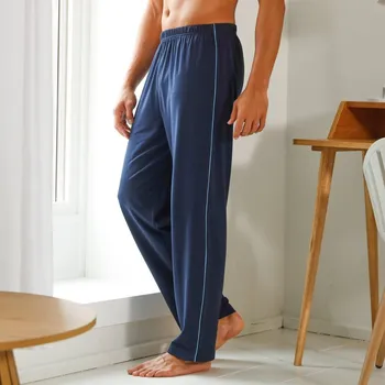 Pánské kalhoty Jednobarevné pyžamové kalhoty s kontrastním zakončením nám.modrá 64/66