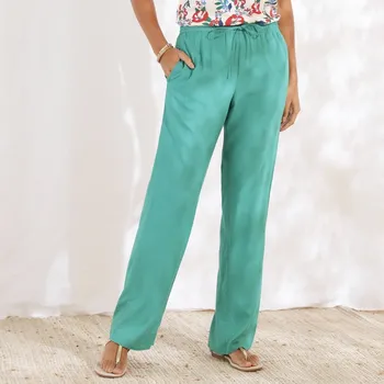 Dámské kalhoty Jednobarevné široké splývavé kalhoty s pružným pasem, z viskózy smaragdová 46