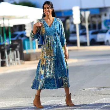 Dámské šaty Kreponové midi šaty s potiskem modrá/bledě modrá 40