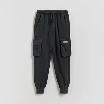 Dětská móda Reserved - Bavlněné kalhoty jogger - tmavě šedá - 402HK-90X - 402HK-90X-128