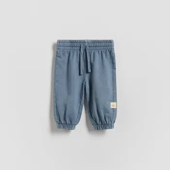 Dětská móda Reserved - Bavlněné kalhoty - modrá - 377HV-55X - 377HV-55X-74