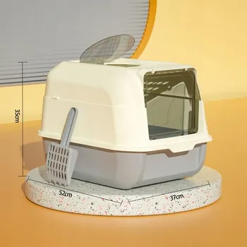 Obraz Toaleta pro kočky s lopatkou, černá