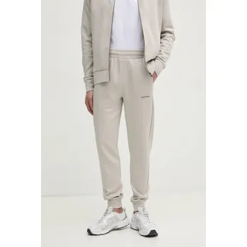 Tepláky Calvin Klein K10K109940 béžová 01X, vel. L